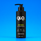 A 200 black pump bottle of GLO FUEL Body Wash, featuring a black label with white and lime green text, set against a vibrant blue gradient background.